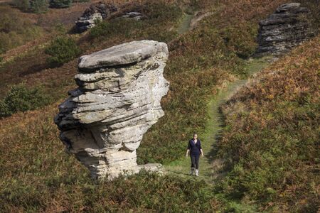 One of the weathered sandstone formations at Bridestones in a moorland part of Dalby Forest in North Yorkshire in the United Kingdom の写真素材