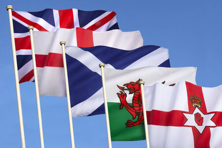 Flags of the United Kingdom of Great Britain - England, Scotland, Wales, Northern Ireland and the Union Flag.の写真素材