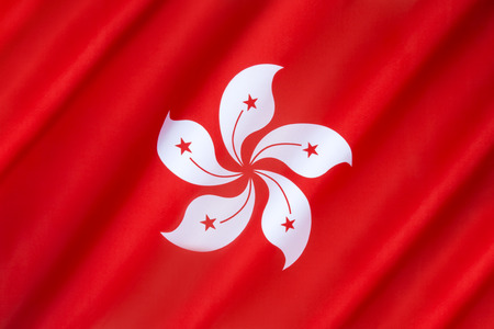 Flag of the Hong Kong Special Administrative Region - The flag of Hong Kong was first officially hoisted on 1st July 1997, in the handover ceremony marking the transfer of sovereignty from the British to the Peoples Republic of China.の写真素材