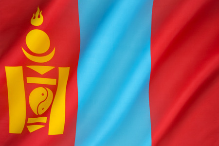 State flag of Mongolia - adopted on February 12th 1992, after the transition of Mongolia to a democracy. It is similar to the earlier flag except for the removal of the socialist star on top of the Soyombo.の写真素材