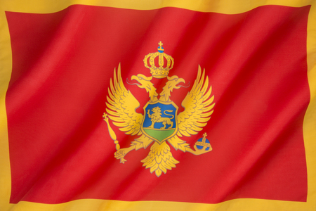 The flag of Montenegro was officially adopted on statehood day on 13th July 2004 at the proposal of the government of Montenegro. It was constitutionally sanctioned with the proclamation of the Constitution on 22nd October 2007.の写真素材