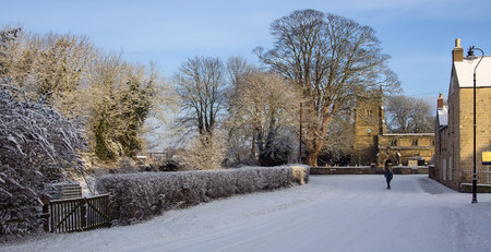 Winter snow in the small village of Slingsby in North Yorkshire in northern England.のeditorial素材