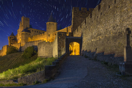 Star Trails above the medieval fortress and walled city of Carcassonne in southwest France. Founded by the Visigoths in the 5th century, it was restored in 1853 and is now a UNESCO World Heritage Site.のeditorial素材