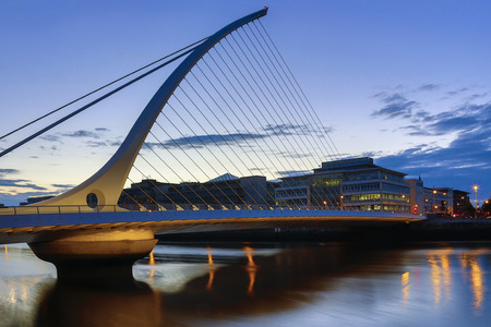 The Samuel Beckett Bridge and the building on the waterfront near the Convention Center - Dublin city center in the republic of Ireland. This is a cable-stayed bridge that joins Sir John Rogerson's Quay on the south side of the River Liffey to Guild Streeのeditorial素材