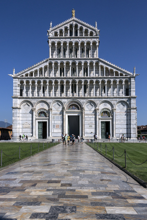 Duomo di Pisa in the city of Pisa in Italy. The Cathedral is located in Piazza dei Miracoli between the Baptistry of St John and the Bell Tower - The Leaning Tower of Pisa. Construction of the Duomo began in 1064 by the architect Buscheto.のeditorial素材