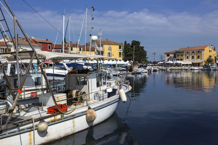 The harbor at Novigrad, a town on the Istria Peninsula in western Croatia. In Croatian it is also sometimes referred to as Novigrad Istarski to distinguish it from three other Croatian towns of the same name. The area is a popular tourist destination.のeditorial素材