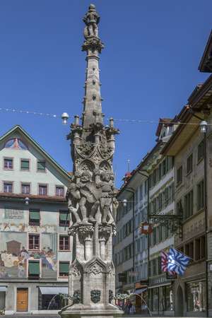Historic buildings and fountain in the Old Town area of the city of Lucerne (Luzurn) in Switzerlandのeditorial素材