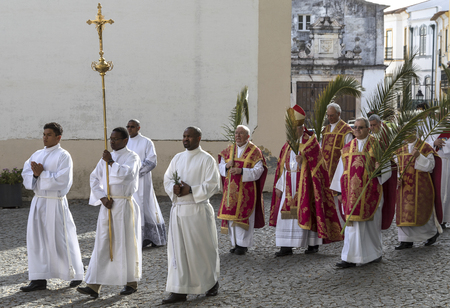 Religious procession on the way to Evora Cathedral in the historic city of Evora in Portugal. Evora is a UNESCO World Heritage Site.のeditorial素材