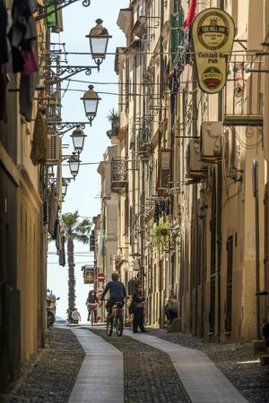 Side street in the city of Alghero in the Province of Sassari on the island of Sardinia - Italy.