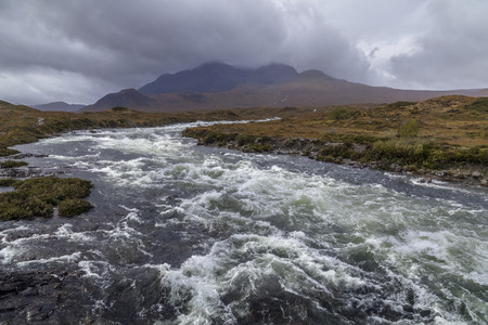 A fast flowing river in the Cuillin Hills on the Isle of Skye in the Inner Hebrides of northwest Scotland.の写真素材