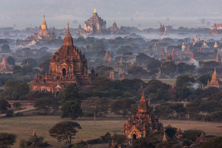 The temples of the Archaeological Zone in Bagan in the early morning sunlight.  Myanmar (Burma).の写真素材