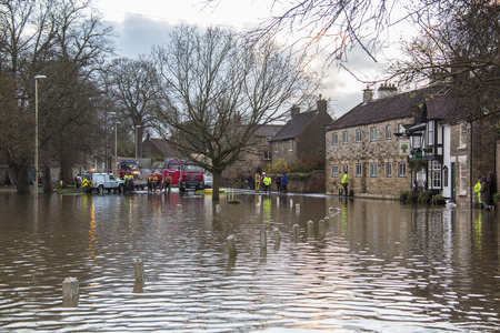 Fire Service using high pressure pumps to drain flooding after the River Derwent burst it's banks in...