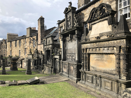 Tombs in Greyfriars Kirkyard. A graveyard surrounding Greyfriars Kirk in Edinburgh, Scotland.のeditorial素材