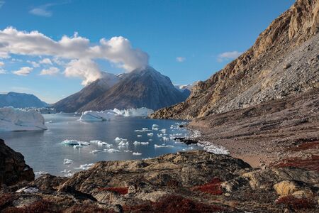 Northwest Fjord in the far reaches of Scoresbysund in eastern Greenlandの写真素材