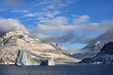 Scoresbysund in eastern Greenland in the late afternoon sunlight.