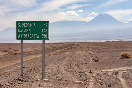 Road sign in the Atacama Desert in northern Chile, South America.の写真素材