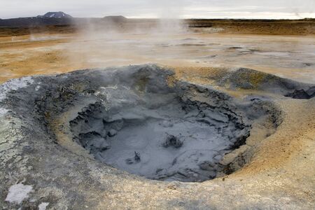 Boiling volcanic mud pool at Namaskard Geothermal Area near Lake Myvatn in northern Iceland.の写真素材
