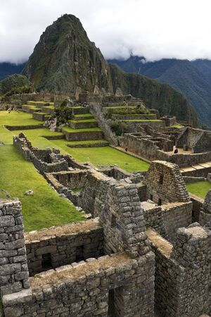 Machu Picchu. Peru. 04.20.08. The Inca city of Machu Picchu in Peru. Although known locally, it was not known to the Spanish during the colonial period and was unknown to the outside world until American historian Hiram Bingham brought it to international attention in 1911.の写真素材