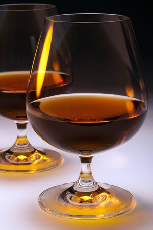 Cognac - French Brandy in Brandy Snifters. Brandy is a spirit produced by distilling wine.の写真素材