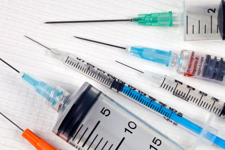 United Kingdom. 04.13.11. Syringes of different sizes for the injection of drugs or vaccine.のeditorial素材