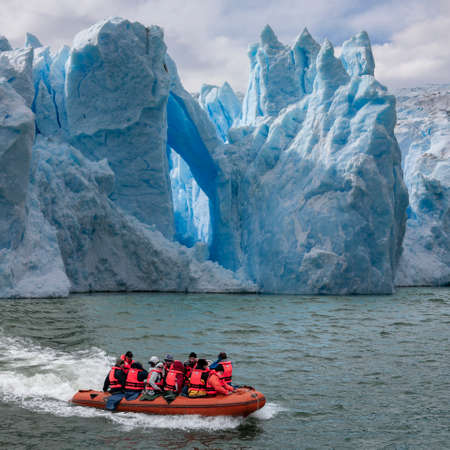 Patagonia. Chile. 11.24.05. Adventure tourists near the Grey Glacier in Torres del Paine National Park in Patagonia, southern Chile, South America.のeditorial素材