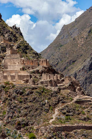 Inca temple ruins above the town of Ollantaytambo in the Sacred Valley of the Incas, Urubamba Province in Peru, South America.のeditorial素材