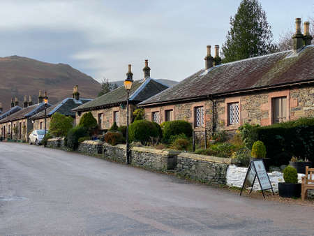 Row of traditional stone cottages at Luss on the shore of Loch Lomond, Scotland.のeditorial素材