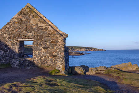 The ruins of a fishermans cottage at Portsoy on the Moray Firth in Aberdeenshire, Scotland.