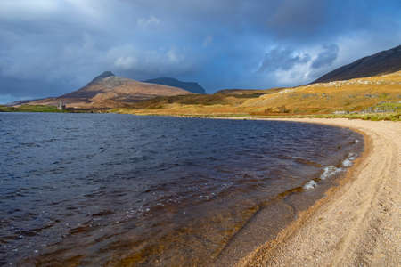 Ardvreck Castle - a ruined castle dating from the 16th century which stands on a rocky promontory in Loch Assynt in Sutherland, Scotland.の写真素材