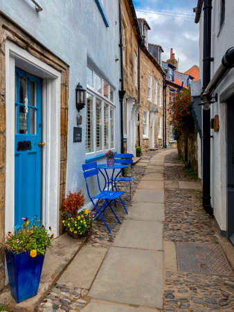 Narrow street in the coastal town of Robin Hoods Bay in North Yorkshire in the United Kingdom.