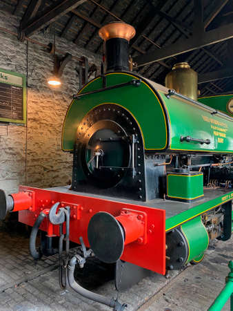 An old Saddle Tank Locomotive in an engine shed at Beamish Open Air Museum in Northumberland in the northeast of England.のeditorial素材