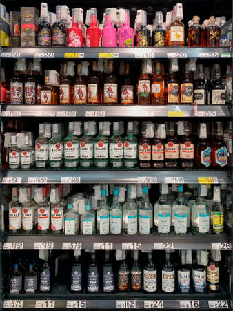 Large selection of alcoholic drinks and wine for sale in a British supermarket.