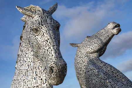 The Kelpies in Falkirk, Scotland. Two 30m high (98ft) horse-head sculptures depicting kelpies (shape-shifting water spirits). They stand next to a new extension to the Forth and Clyde Canal, and near River Carron, in The Helix parkland project. Opened to のeditorial素材