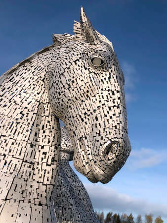 The Kelpies in Falkirk, Scotland. Two 30m high (98ft) horse-head sculptures depicting kelpies (shape-shifting water spirits). They stand next to a new extension to the Forth and Clyde Canal, and near River Carron, in The Helix parkland project. Opened to のeditorial素材