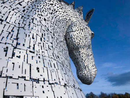 The Kelpies in Falkirk, Scotland. Two 30m high (98ft) horse-head sculptures depicting kelpies (shape-shifting water spirits). They stand next to a new extension to the Forth and Clyde Canal, and near River Carron, in The Helix parkland project. Opened to のeditorial素材