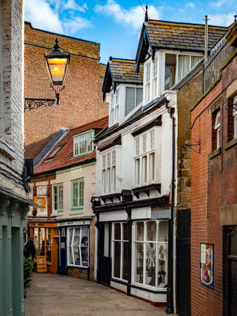 Narrow street in the coastal town of Whitby in North Yorkshire on the northeast coast of England.