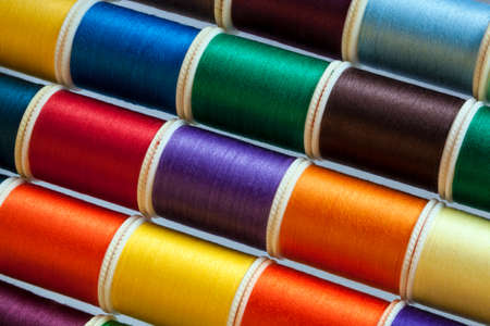 Range of colored sewing threads.