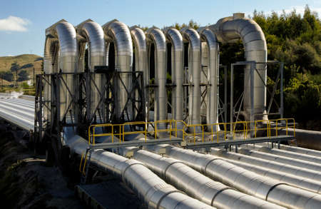 Expansion loops in steam piles at the geothermal power plant at Wairakei in New Zealand. Geothermal...