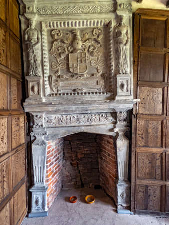Fireplace in Little Moreton Hall, a 16th-century half-timbered Manor House near Congleton in Cheshire, northwest England.のeditorial素材