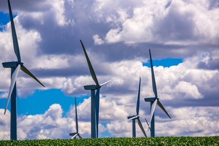 Wind powered electricity generators sitting at the top of a hill. Located in Eastern Oregon.の写真素材