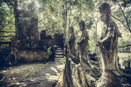 Stone Buddha statue at Angkor Wat, Siem Reap, Cambodia.の写真素材