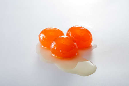 Three salted duck egg yolksの写真素材