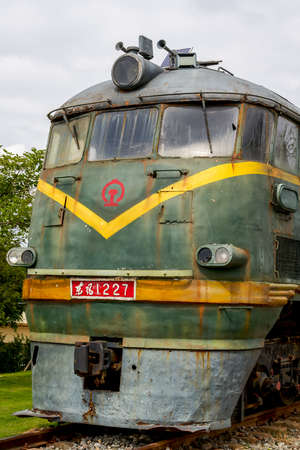 Closeup of an abandoned vintage locomotive in China, translation: East windのeditorial素材