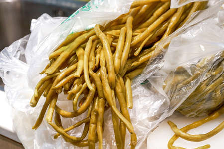 A close-up of whole capers, a specialty of Guangxi