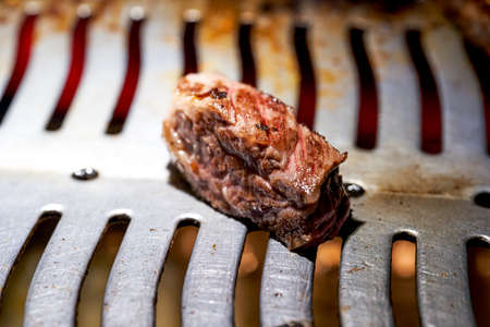 Closeup of Japanese yakiniku being cooked on grillの写真素材