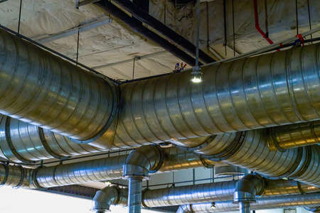 Fume exhaust pipes crisscrossed in the restaurant