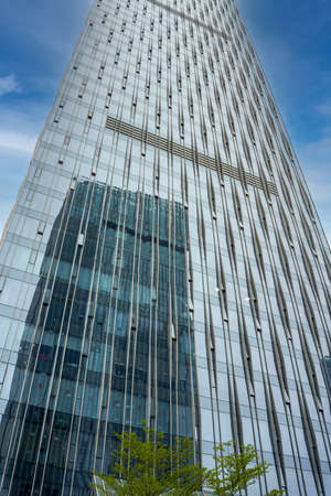 Modern architecture high-rise building, glass curtain wall office building