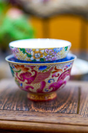 Chinese style painted teapots, cups and various tea sets