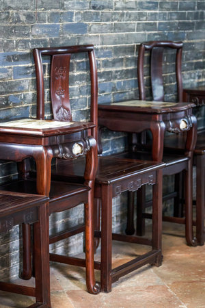 Exquisitely carved mahogany furniture in the Chen Clan Ancestral Hall in Guangzhouの写真素材