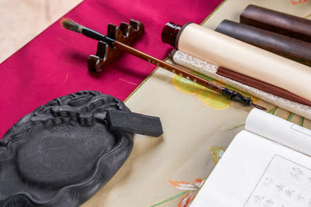 Pen, ink, paper, inkstone and writing desk of traditional Chinese calligraphyの写真素材